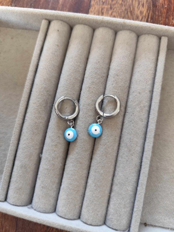 Producto - Aros argolla ojito celeste. Acero quirúrgico