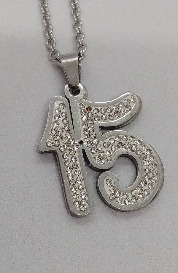 Producto - Dije del numero 15 con strass