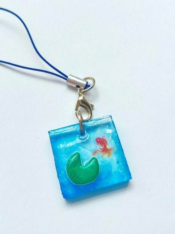Producto - Phone charm estanque
