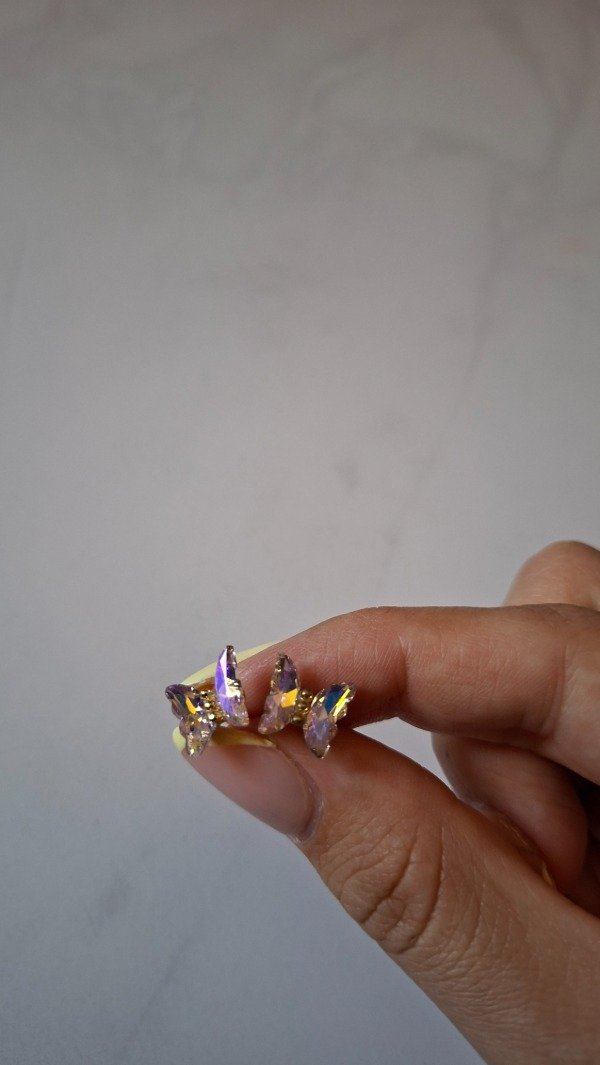 Producto - Aros de acero dorado mariposa tornasolado