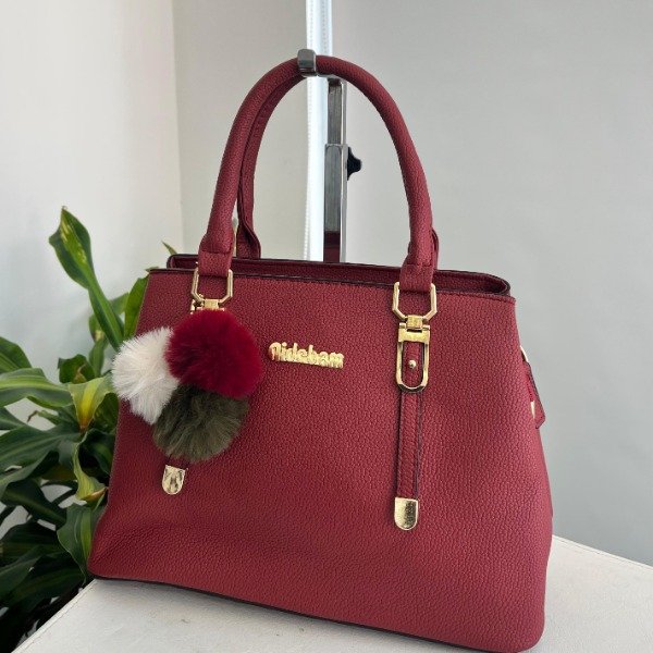 Producto - Cartera Nideban con llavero pompom