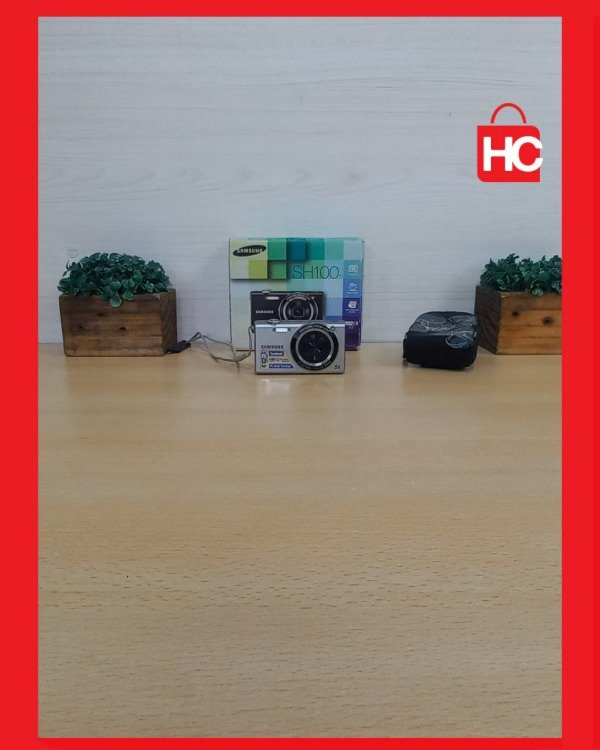 Producto - Cámara digital compacta Samsung SH100 con Wi-Fi - Completa con caja y funda - 0