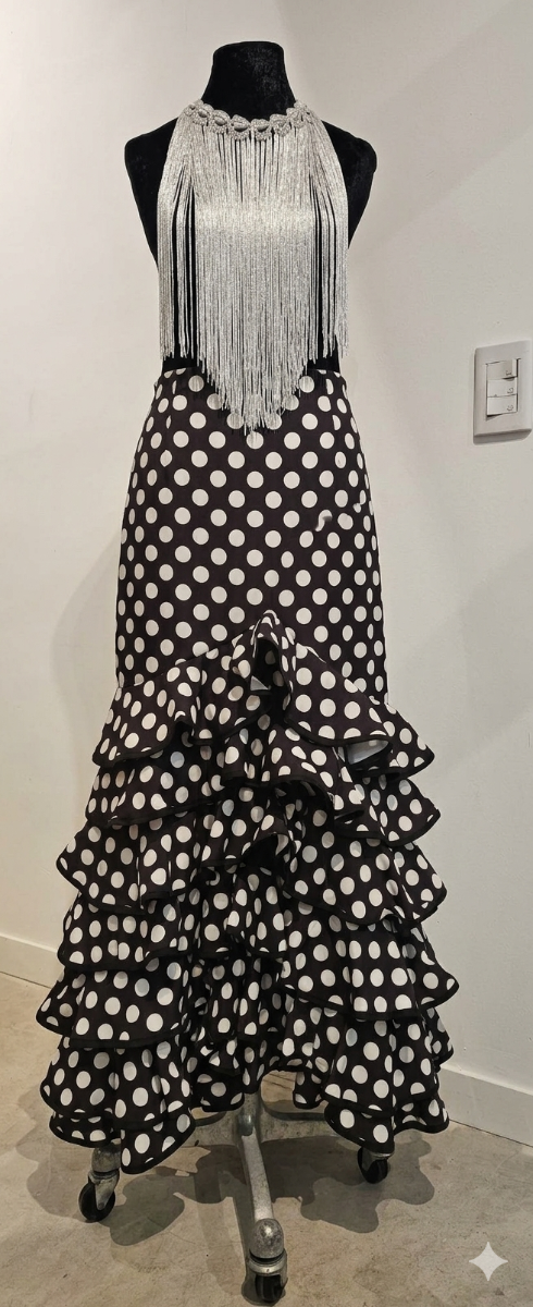 Producto - FALDA MONETA TM NEGRA LUNAR BLANCO. FALDA DETELA RIGIDA CON VOLADOS ENVIVADOS