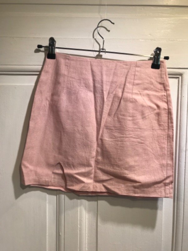 Producto - Falda rosa de lino con tajo-Talle XS- PRECIO: 16x