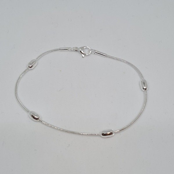 Producto - Pulsera plateada clapton c/aceitunas 19cm