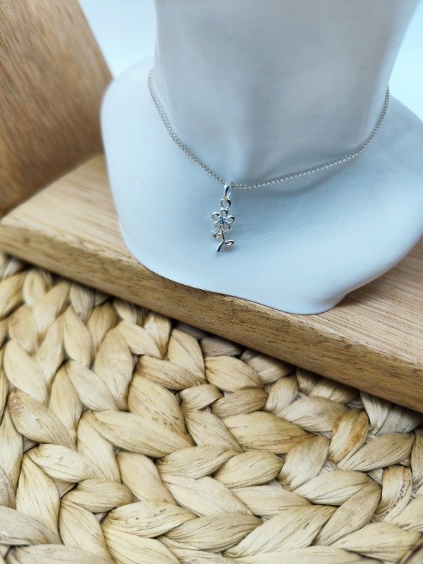 Producto - Dije Flowi