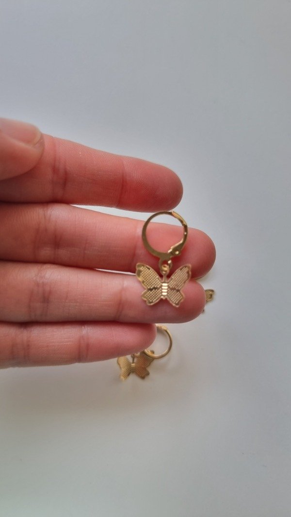 Producto - Dije DORADO 7