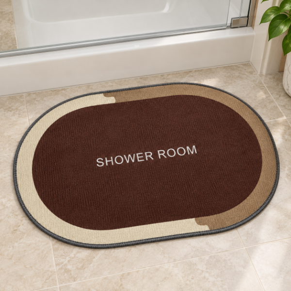 Producto - ALFOMBRA SHOWER ROOM TEXTIL OVALADA CON ANTIDESLIZANTE 55X38CM - 1