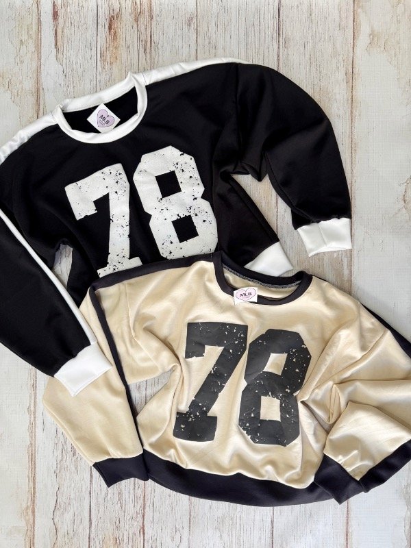 Producto - Buzo número combinado