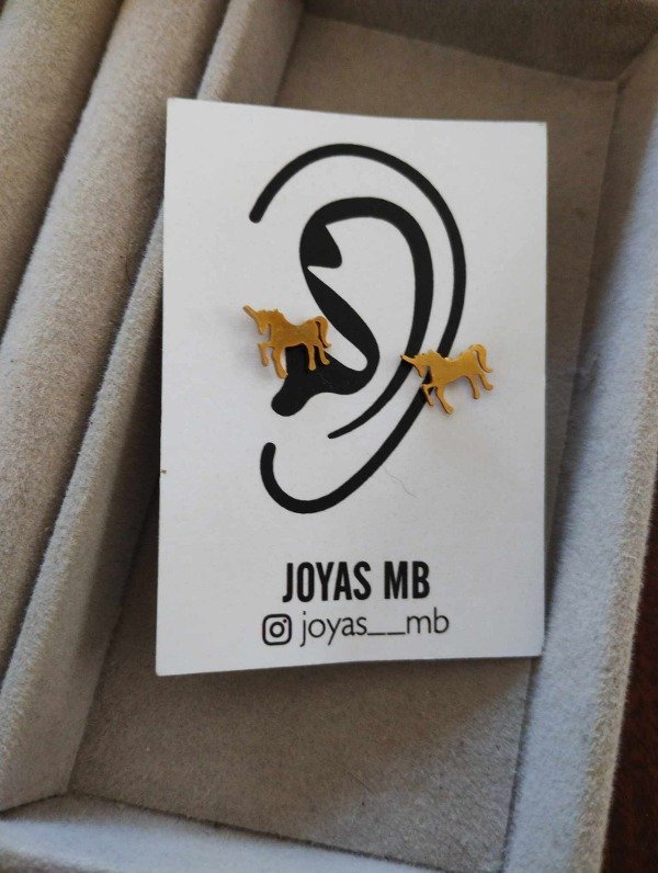 Producto - Aros unicornio. Acero dorado