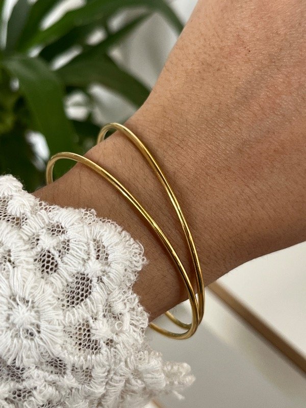 Producto - Esclavas acero dorado