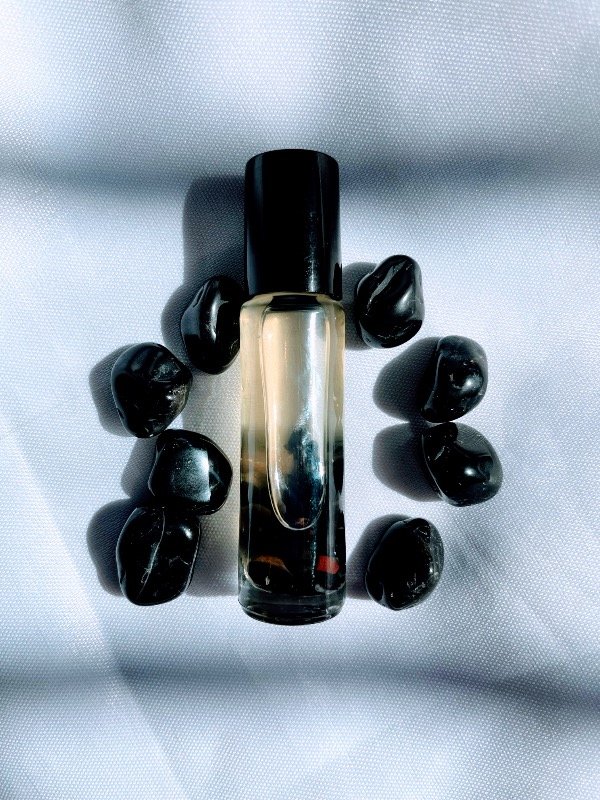 Producto - PERFUME FLUIR" - Chakra Raíz -  Protege, enraíza, confianza-