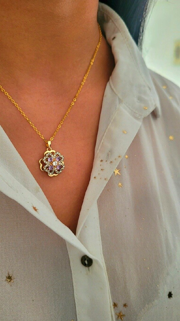 Producto - Collar trébol de acero dorado con dije giratorio - 0
