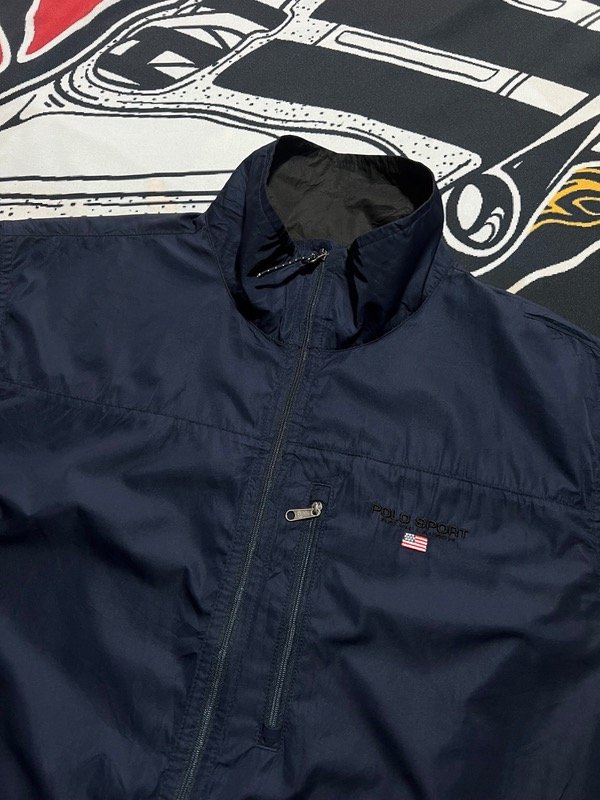 Producto - Rompeviento Polo Sport azul oscuro. Talle L amplio