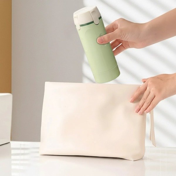 Producto - ENVASE DISPENSER DE CHAMPU CREMAS PARA VIAJE 4 EN 1 RECARGABLE 120ML 17CM X 6CM - 6