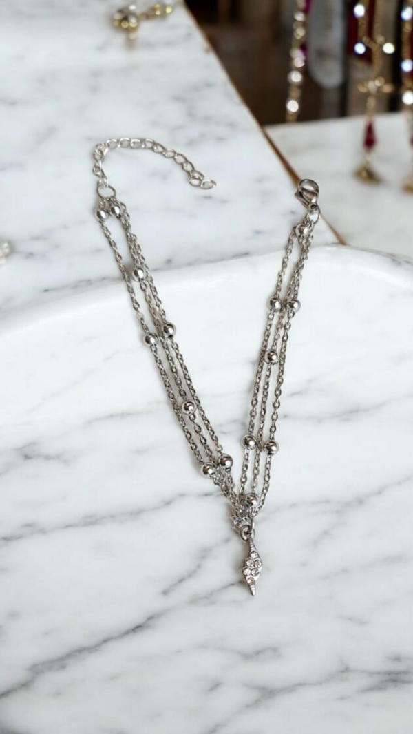 Producto - Pulsera triple con dije de rayo