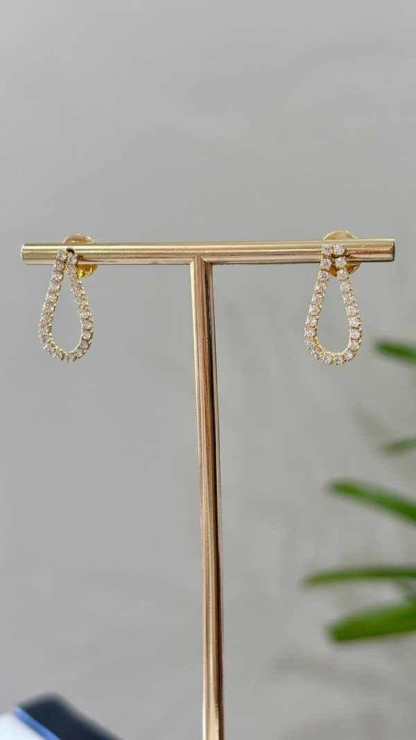 Producto - Aros stras gotita colgante laminados en oro 18k