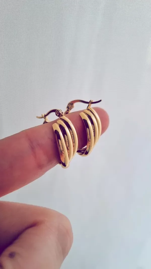 Producto - Argollitas triples acero dorado