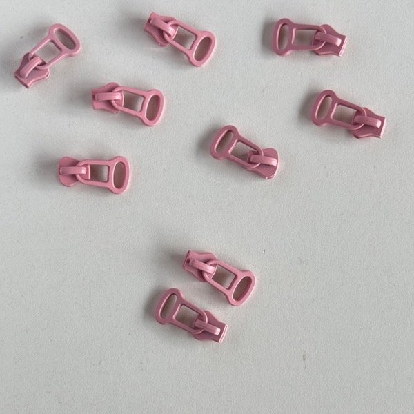 Producto - Deslizador diente de perro rosa x 5u.