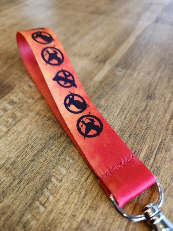 Producto - Llavero cinta "Sinsajo"