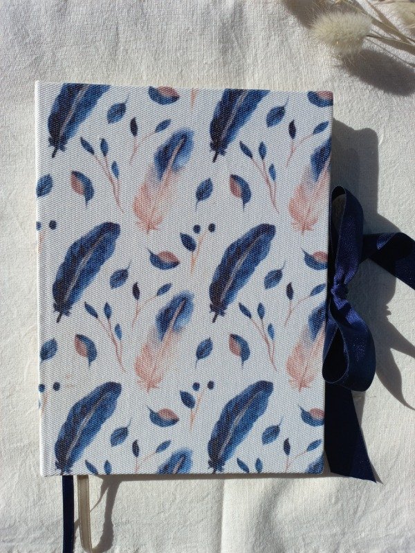 Producto - Cuaderno  plumas