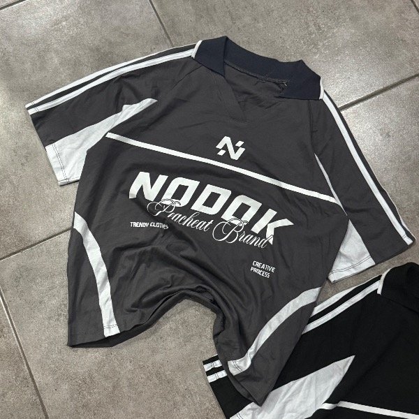 Producto - CHOMBA BOXY NOOOK GREY