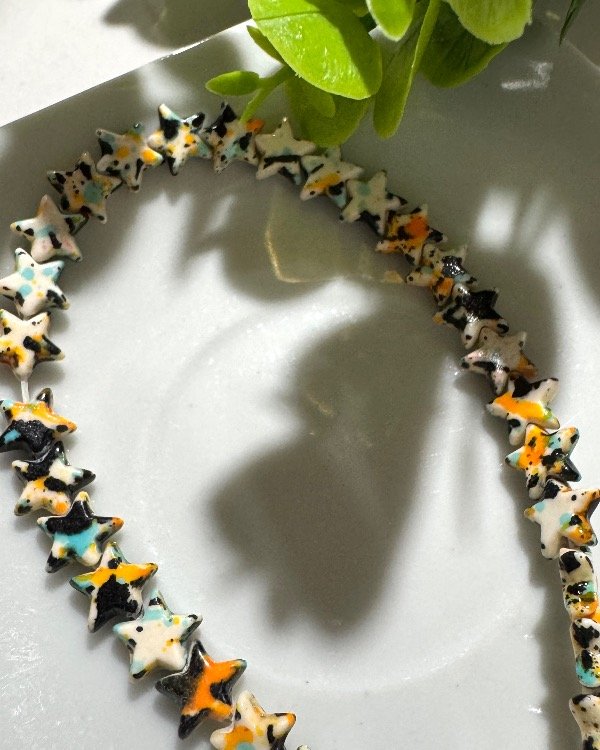 Producto - TIRA ESTRELLITA PIEDRAS NARANJA-TURQ