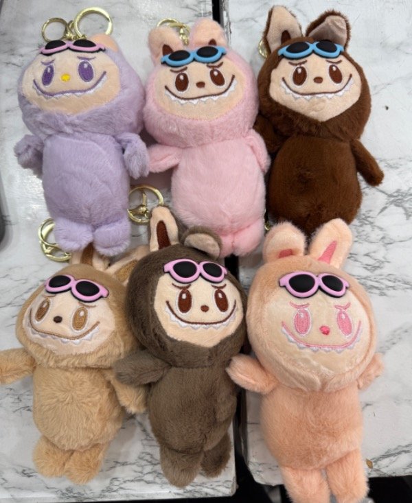 Producto - Peluche labubu con anteojo