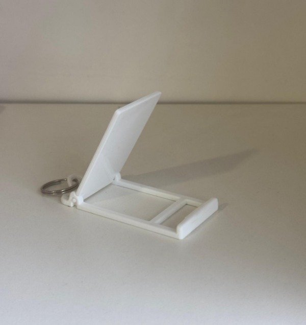 Producto - LLAVERO POSA CELULAR DE POLIMERO SUBLIMABLE