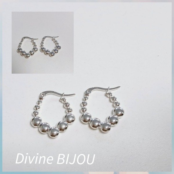 Producto - Argollas bolitas  abundancia acero blanco