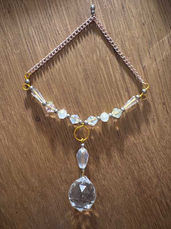 Producto - Atrapasol puro cristal con cadena - 1