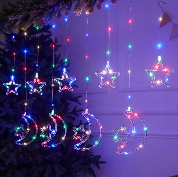 Producto - Cortina De Luces Led Navideñas Estrellas lunas y estrellas multicolor 3M