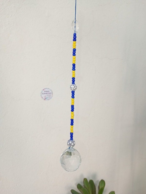 Producto - Atrapasol de tu equipo con esfera de 3 cm.