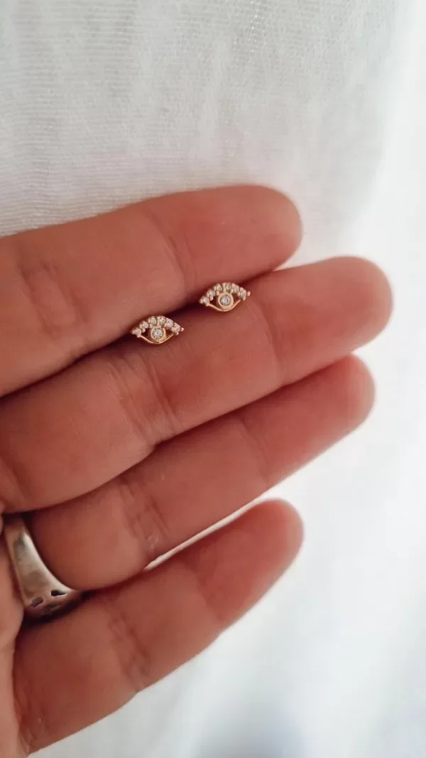 Producto - Aros pasantes ojo con detalles en cubic blanco encjapado