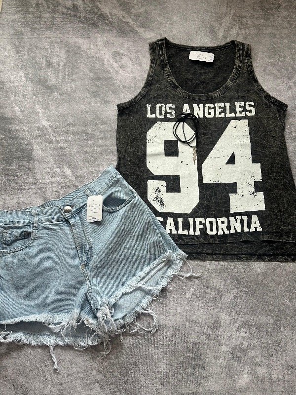 Producto - short celeste desflecado