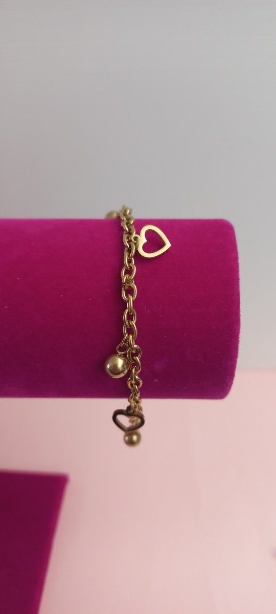Producto - Pulsera bolitas y corazón en acero dorado 19cm