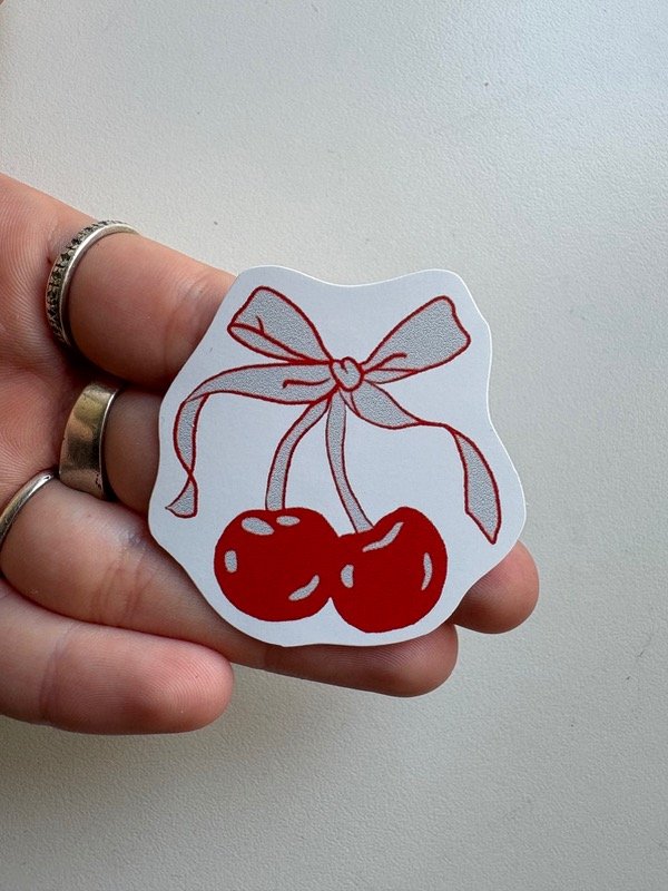 Producto - Sticker cerezas moño