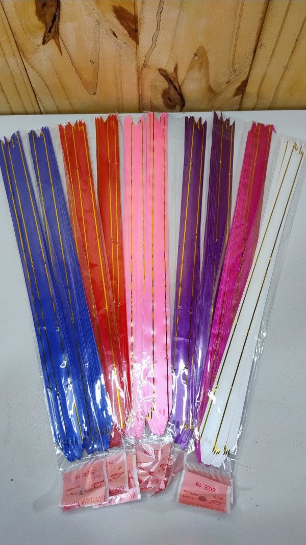 Producto - Moños mediano x 100u.