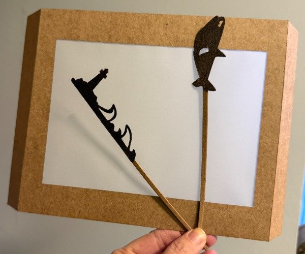 Producto - Souvenir con pantalla, dos títeres y linterna - 2