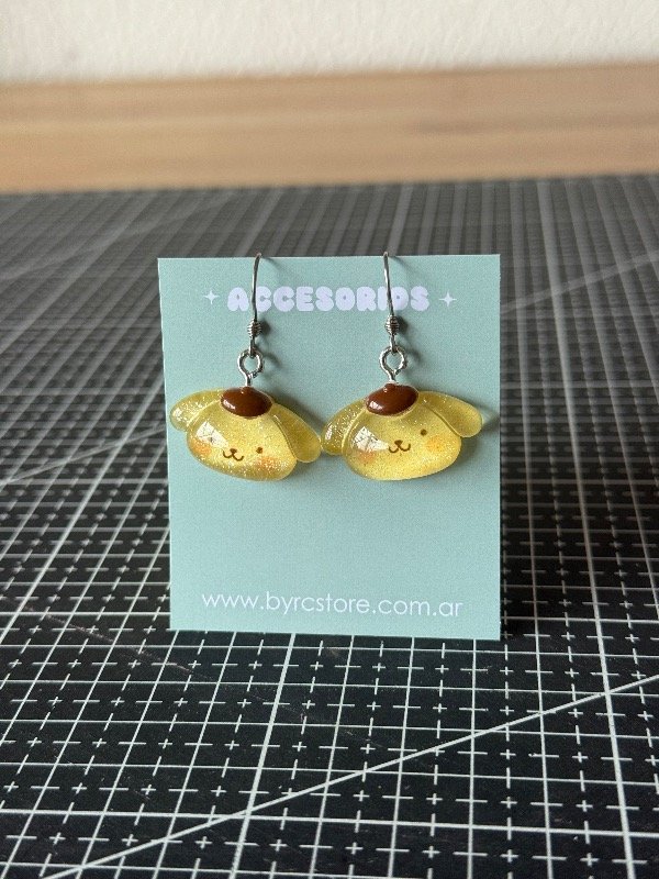 Producto - Aros Colgantes Pompompurin Glitter Sanrio