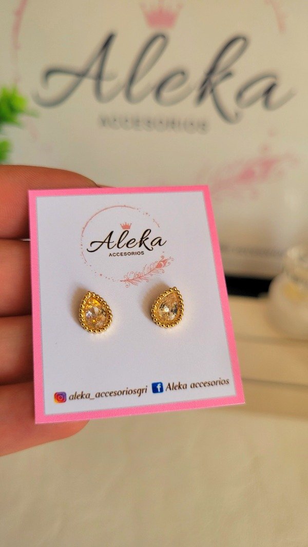 Producto - Aros gotas cubic blanco de acero dorado - 0