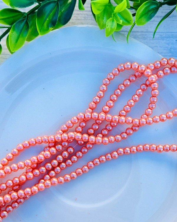 Producto - TIRA PERLA CORAL 4MM