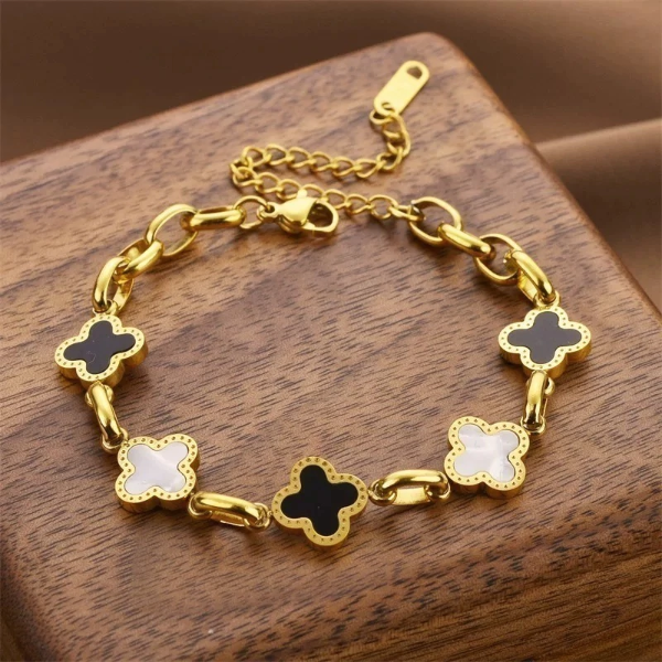 Producto - Pulsera acero dorado trébol blanco y negro
