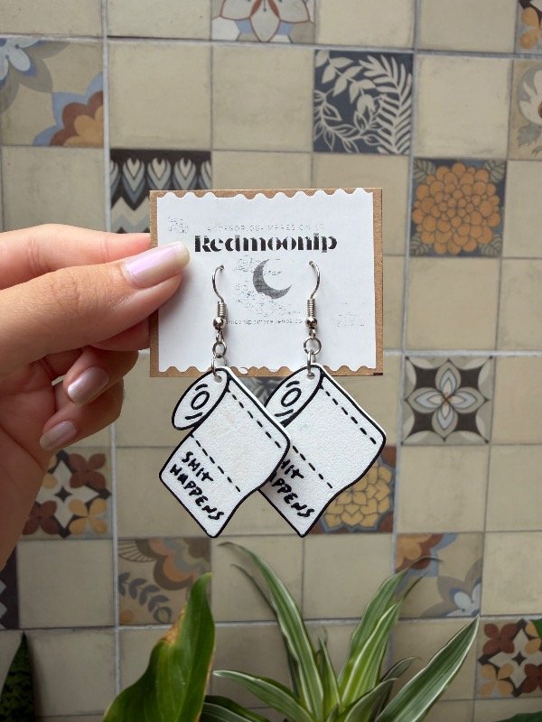 Producto - Aros Shit Happens