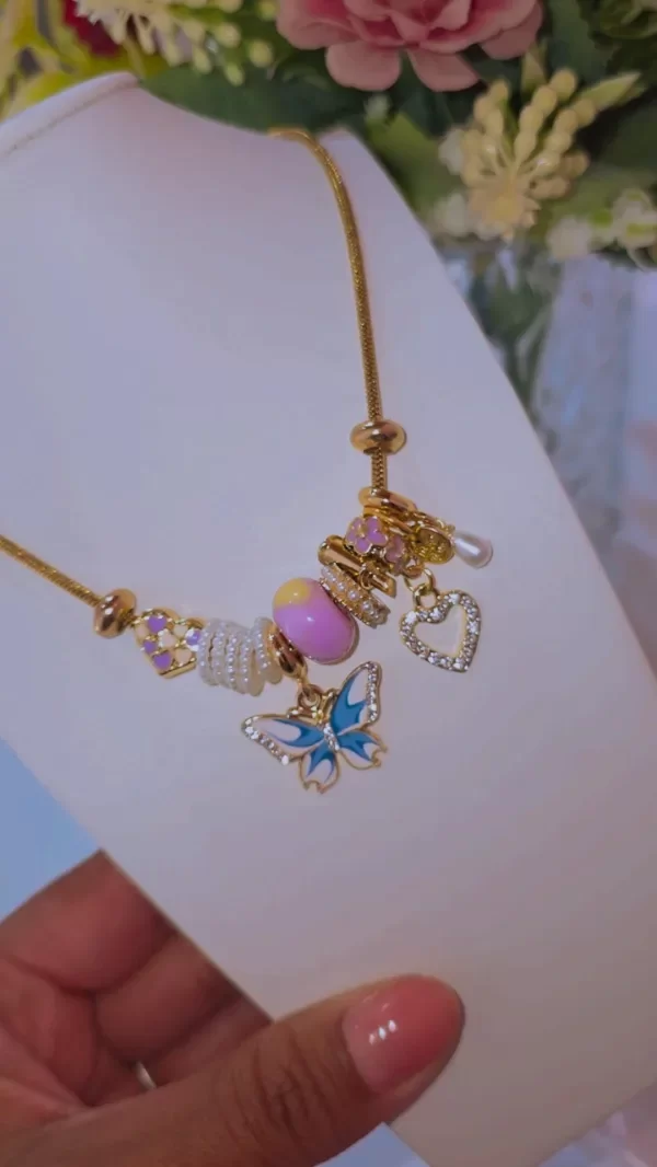 Producto - Collar dijes varios mariposa azul AD