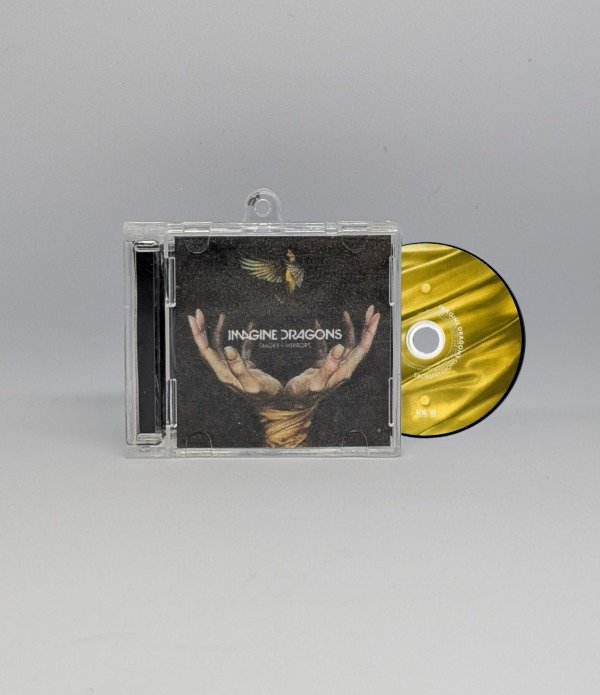 Producto - Smoke + Mirrors - Llavero CD