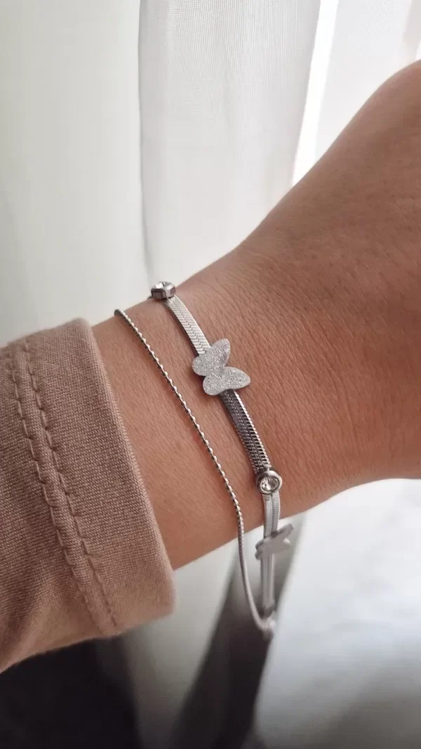Producto - Pulsera doble AQ triple mariposa con susanito