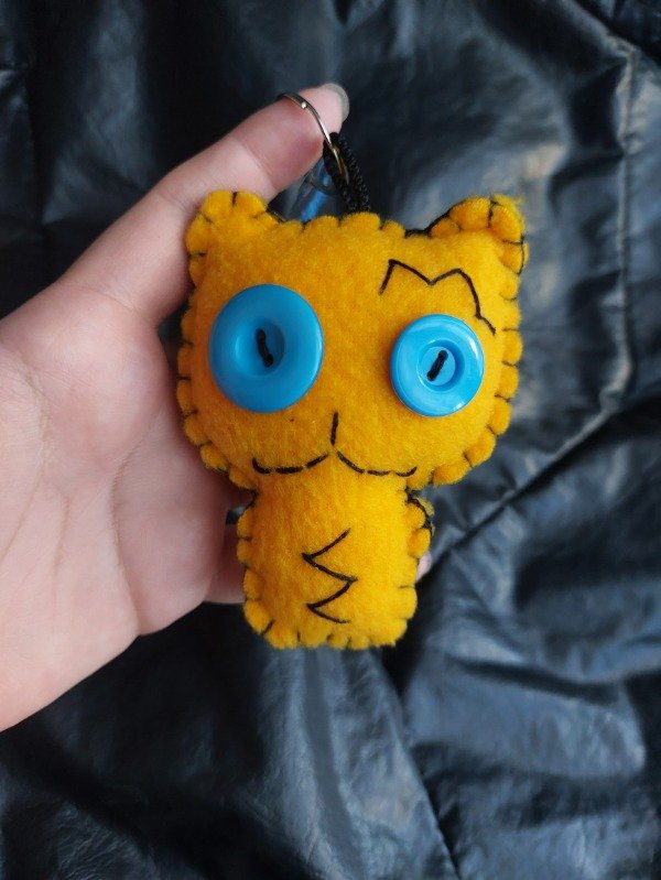 Producto - Kitten amarillo y turquesa