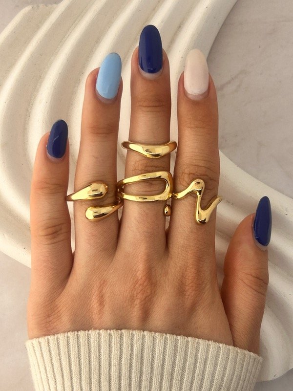 Producto - ANILLO REGULABLE DORADO 3050