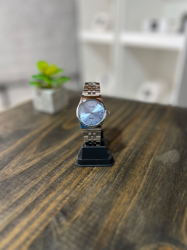 Producto - CASIO MTP B145D CELESTE